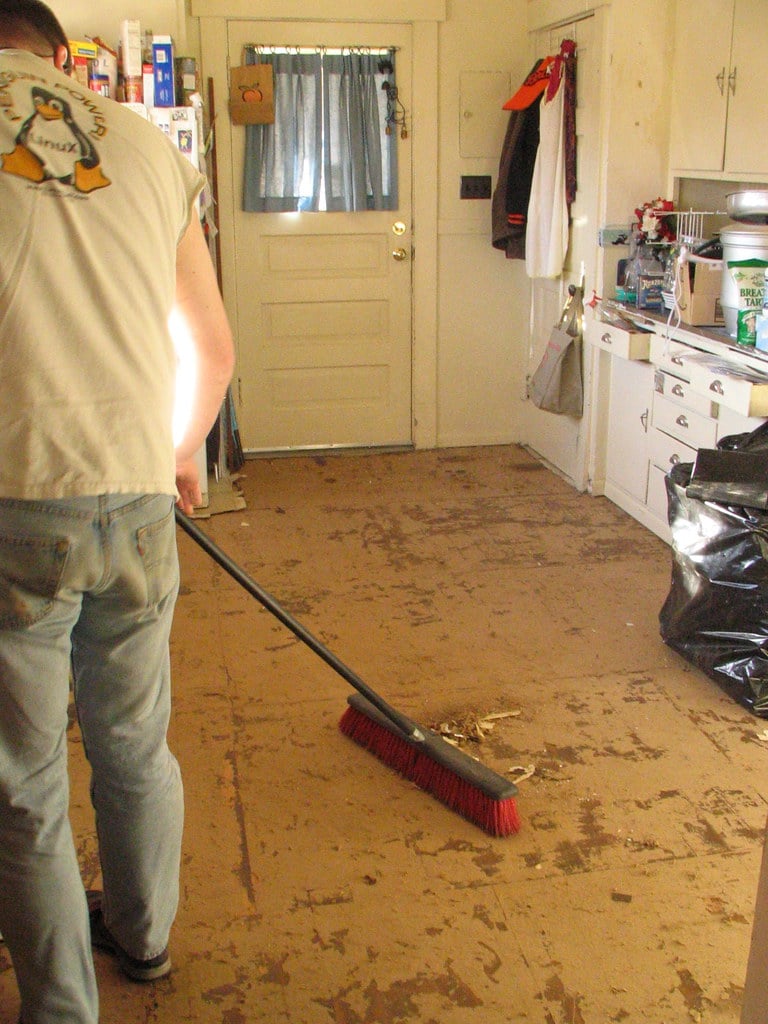 A person preparing for a new floor