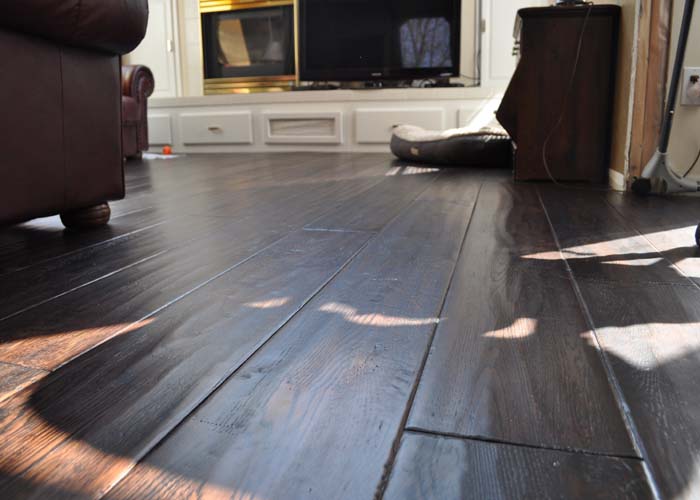 A close to the floor picture of solid hardwood flooring